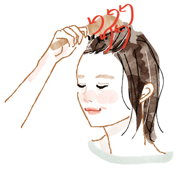 生え際にブラシを縦にあて、小さな円を描くようにとかすイラスト